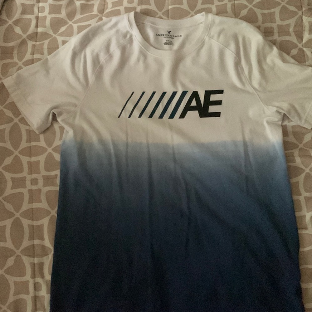 American Eagle blue + white gradient tee w/ black AE branding.